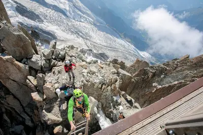 two people on a mountain top with a view at Chamonix Sud - Bâtiment Iris 374 - Happy Rentals in Chamonix-Mont-Blanc