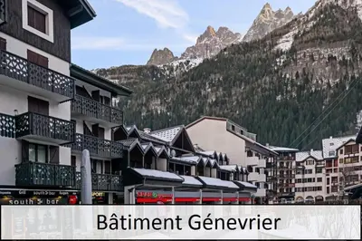 a group of buildings in front of a mountain at L'Aiguille - maeva Home - 2 Pièces 5 Personnes Confort MAE-2139 in Chamonix-Mont-Blanc