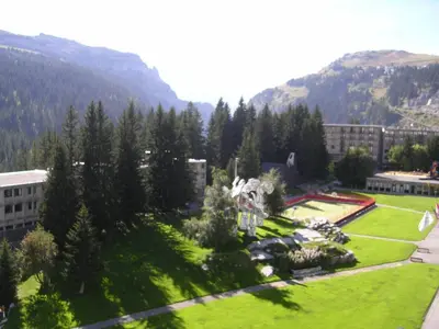a view of a park with trees and buildings at Studio lumineux balcon ski aux pieds - 4 pers. - FR-1-425-223 in Arâches-la-Frasse