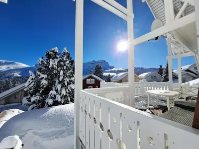a view from the balcony of a house in the snow at Les Chalets de Flaine Hameau - maeva Home - Chalet 3 Pièces 8 Personnes - Confort MAE-3392 in Flaine