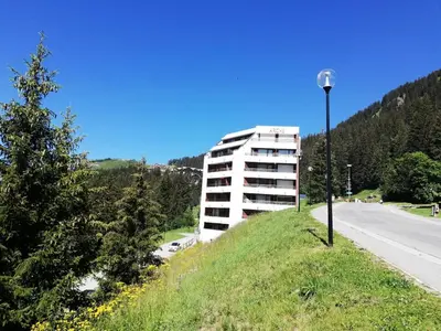 a building on the side of a hill with a street light at Résidence Arche - maeva Home - Studio 4 Personnes - Confort MAE-3697 in Arâches-la-Frasse