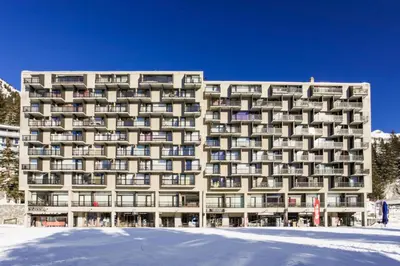 a building with snow in front of it at Résidence Aldébaran - maeva Home - Studio 4 personnes - Confort MAE-3799 in Arâches-la-Frasse