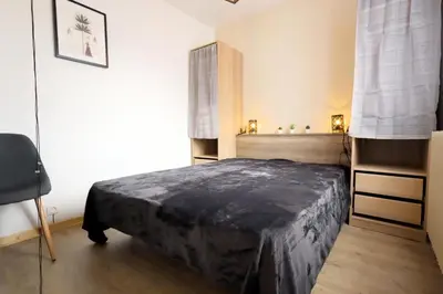 a bedroom with a bed in a room at Résidence Les Esserts - Les Esserts MAE-8381 in Les Houches