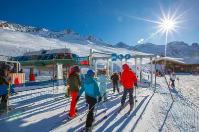 a group of people on skis at a ski lift at Appartement Le Grenier - Happy Rentals in Chamonix-Mont-Blanc