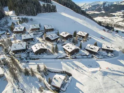 an aerial view of a resort in the snow at Appartement cosy avec terrasse à Megève, idéal pour 2 à 3 personnes - FR-1-453-317 in Megève