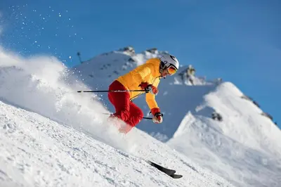 a snow covered mountain with a snow covered slope at Ancolie - Apartment Free parking close to ski lift - By Cozee Rentals in Chamonix-Mont-Blanc