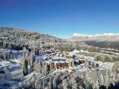 a table and chairs on a balcony with a view at Appartement confortable au pied des pistes pour 8 personnes - FR-1-642-104 in Morillon