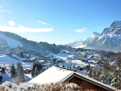 a small town in the snow with a mountain at Appartement aux Carroz d'Arâches, 4 pers, 39 m² - FR-1-572-327 in Arâches-la-Frasse