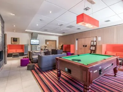 a lobby with a pool table in a room at Appartement 2 Pièces Pied des Pistes avec Wi-Fi et Parking - FR-1-687-120 in Arâches-la-Frasse