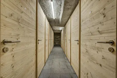 a hallway with wooden walls and a ceiling at Brume - 2CH 2SDB Vues Remontees 400m Garage SPA in Les Houches