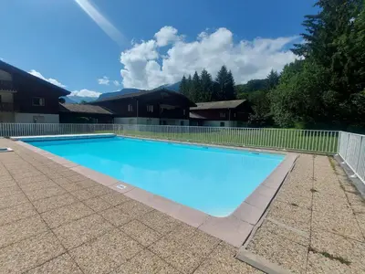 a bathroom with a sink and a shower at Appartement familial à Samoëns avec piscine et parking - FR-1-624-189 in Samoëns