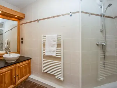 a bathroom with a shower and a sink at Apartment Wohnung in Chamonix Centre-Ville by Interhome in Chamonix-Mont-Blanc