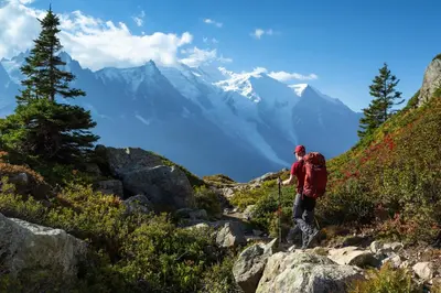 a group of people walking up a snow covered mountain at Chamonix Sud - Grepon 104 - Happy Rentals in Chamonix-Mont-Blanc