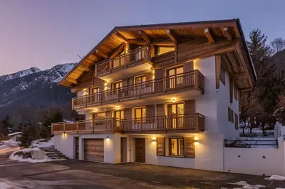 a large house with a balcony on top of it at Jacaranda 5 - Sublime 6pax - Central - Confort - Parking in Chamonix-Mont-Blanc