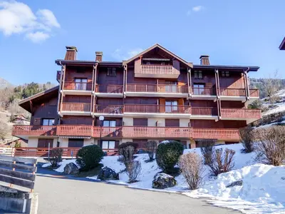 a building with balconies on the side of it at Studio La pointe des Aravis 3 by Interhome in Saint-Gervais-les-Bains