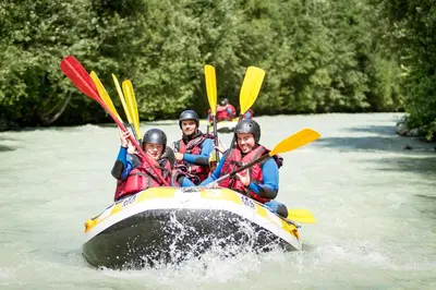 a group of people in a raft on a river at Le Paradis 18 & 18b appts - Chamonix All Year in Chamonix-Mont-Blanc