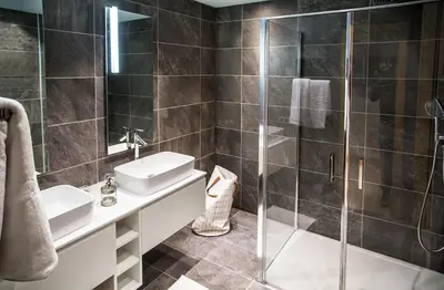 a bathroom with a sink and a shower at Luxury appart – Megève – АЕ202 in Megève