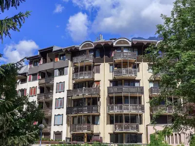 an apartment building with balconies on the side of it at Apartment Jonquilles-15 by Interhome in Chamonix-Mont-Blanc