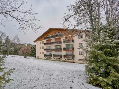a large building with snow on the ground at Charmant T2 au cœur de Megève pour 3 personnes - FR-1-453-106 in Megève