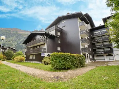 a building with balconies on the side of it at Apartment Clos du Savoy-8 by Interhome in Chamonix-Mont-Blanc
