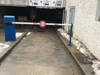 a entrance to a building with a no parking sign at Appartement à Chamonix avec Balcon, Animaux Acceptés et Parking - FR-1-517-12 in Chamonix-Mont-Blanc