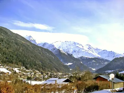 a view of a mountain range with snow covered mountains at Apartment Le Parc du Mont Joly-2 by Interhome in Saint-Gervais-les-Bains