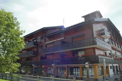 a large building with balconies on the side of it at CA111 - Studio 4 pers centre des Carroz in Les Carroz d'Araches