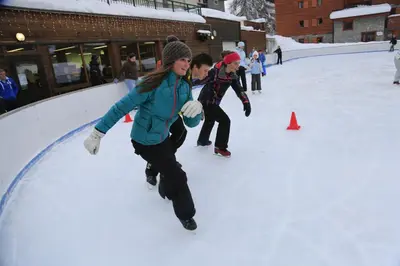 a group of people playing in the snow at MA002 2 Pièces 4 Pers centre Carroz in Les Carroz d'Araches