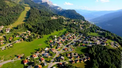 an aerial view of a village in the mountains at VAR50 - Studio 4 Pers centre des Carroz in Les Carroz d'Araches