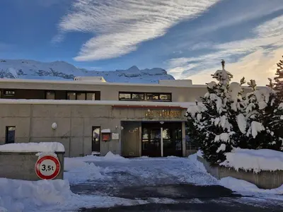 a building with snow in front of it at Appartement lumineux avec balcon au centre station - FR-1-425-141 in Flaine
