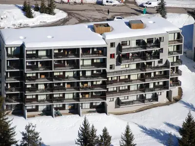 an aerial view of a hotel in the snow at Appartement rénové, Balcon sud, Animaux admis, Parking en option - FR-1-425-155 in Flaine