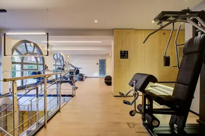 a gym with treadmills and a treadmill at California in Chamonix-Mont-Blanc