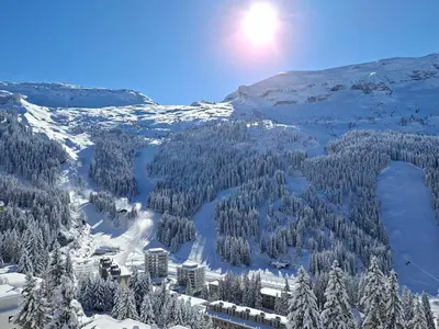 a view of a snow covered mountain with a resort at Studio lumineux avec balcon et casier à ski proche des pistes - FR-1-425-185 in Arâches-la-Frasse