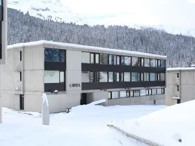 a building in the snow in front of a mountain at Studio cosy 4 pers, skis aux pieds, terrasse sud, Flaine Front de Neige - FR-1-687-73 in Arâches-la-Frasse
