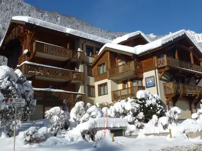 a ski lodge in the snow with snow covered trees at Bel appartement 3 étoiles avec parking et wifi, proche pistes à Chamonix - FR-1-343-168 in Chamonix-Mont-Blanc