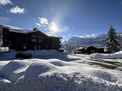 a pile of snow in front of a house at Studio spacieux 5 pers avec parking aux Carroz d'Arâches - FR-1-572-192 in Arâches-la-Frasse