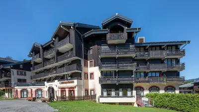a building with balconies on the side of it at Grand Morillon- C215 Appt vue piste-4 pers in Morillon