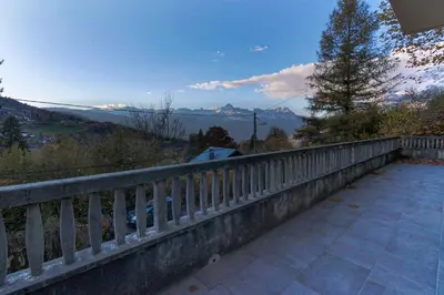 a balcony of a house with a view of the mountains at Saint Éloi - Panoramic view - Mont Joly - Central in Saint-Gervais-les-Bains