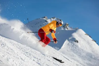 a person is skiing down a snow covered slope at Chalet Benoit - Modern Chalet 8 Pax Free Parking Mountain View - By Cozee Rentals in Chamonix-Mont-Blanc
